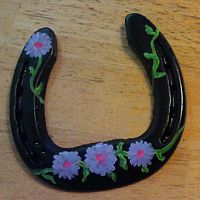 BlackShoeandPurpleDaisies.jpg