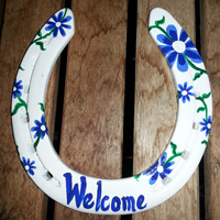 WhiteWithBlueDaisiesWelcome